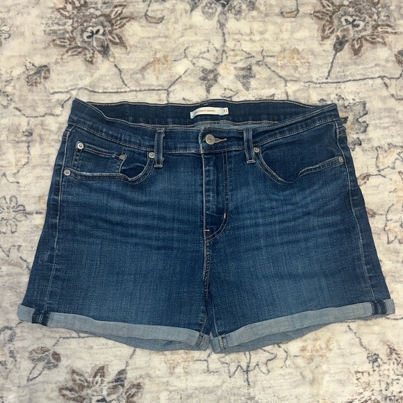 Levi's Pants - Levi's Women's mid rise Dark Blue Rolled-Hem Denim Shorts